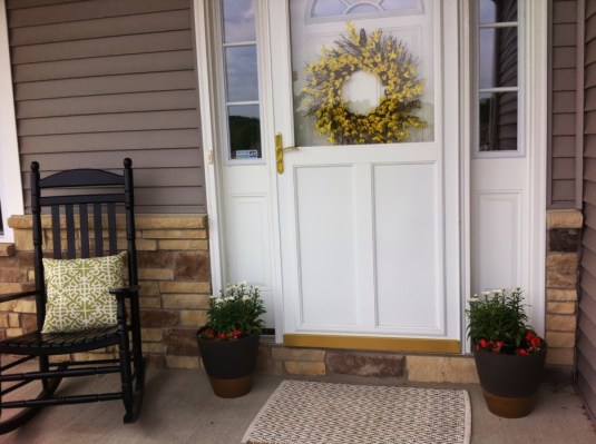 single chair on a porch