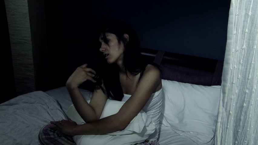 sad girl on bed