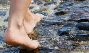 Stepping-into-river