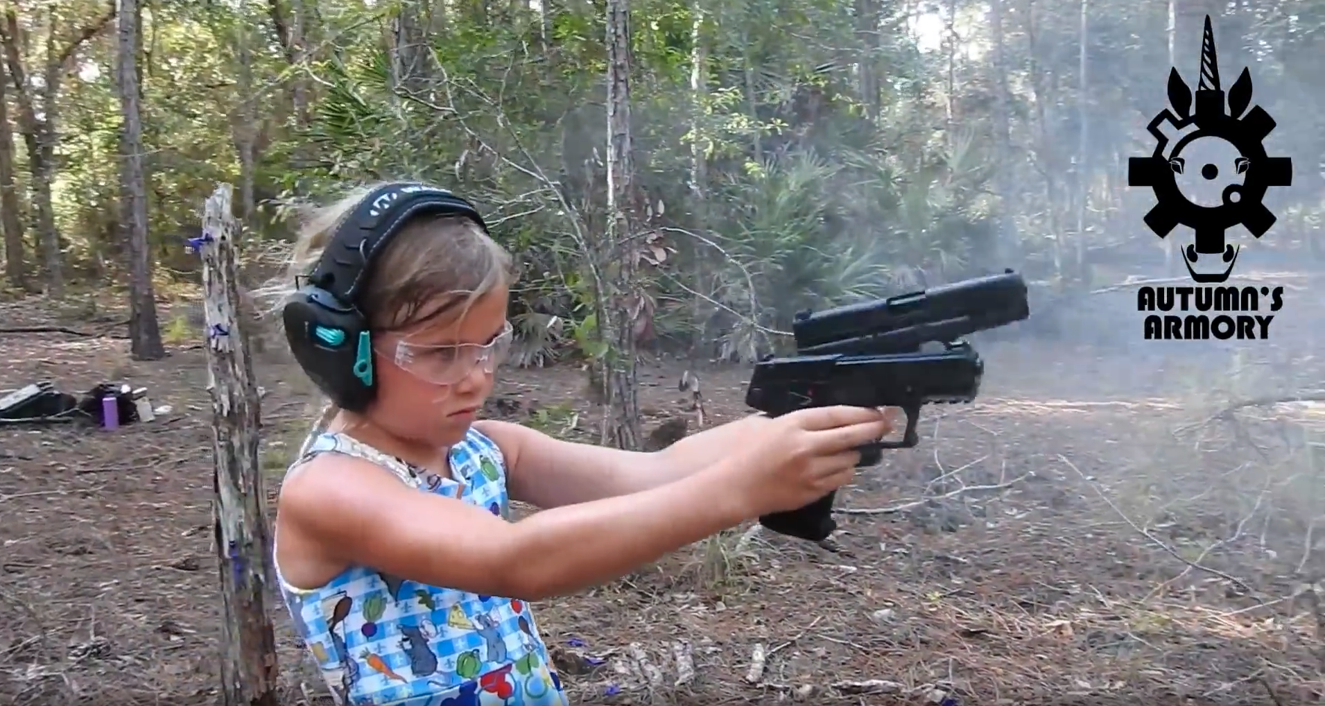 young-girl-firing-two-guns